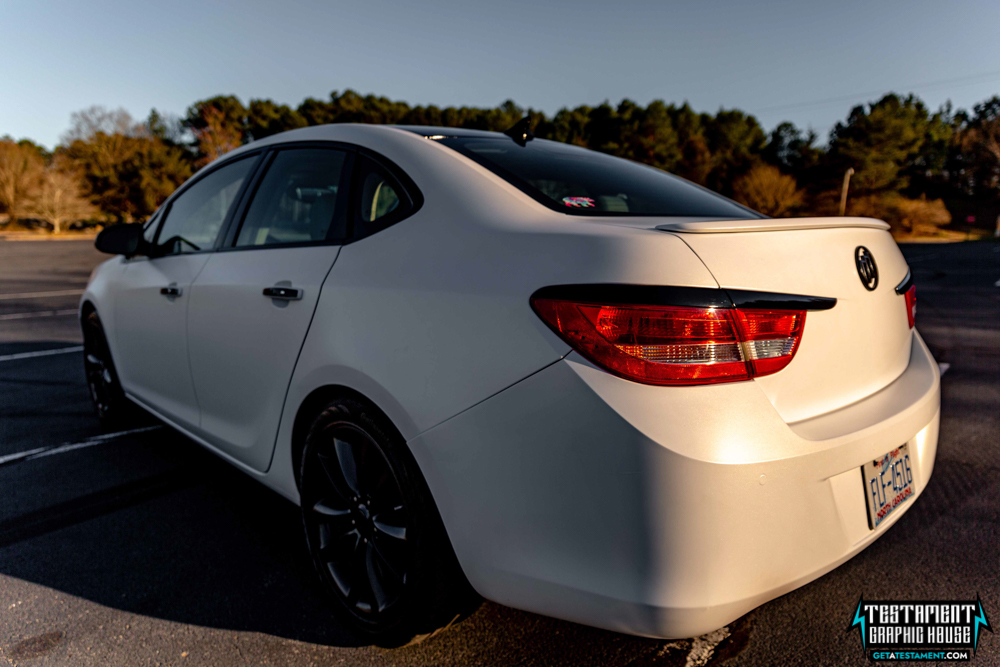 2014 Buick Verano Wrapped in 3M Satin White with a full Chrome Delete Testament Graphic House Denver NC