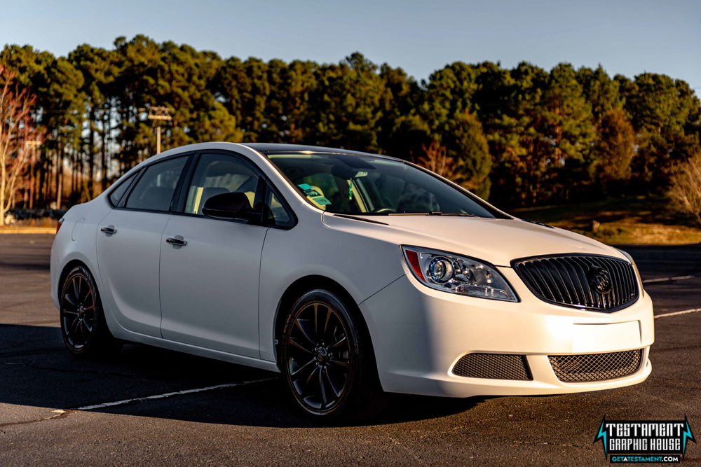 2014 Buick Verano Wrapped in 3M Satin White with a full Chrome Delete Testament Graphic House Denver NC