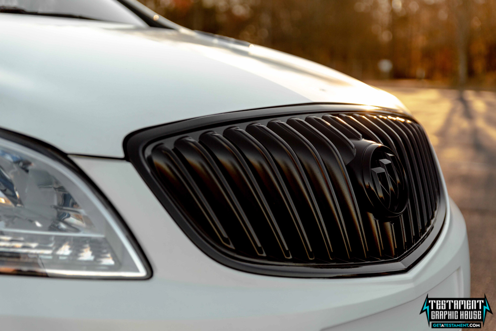 2014 Buick Verano Wrapped in 3M Satin White with a full Chrome Delete Testament Graphic House Denver NC