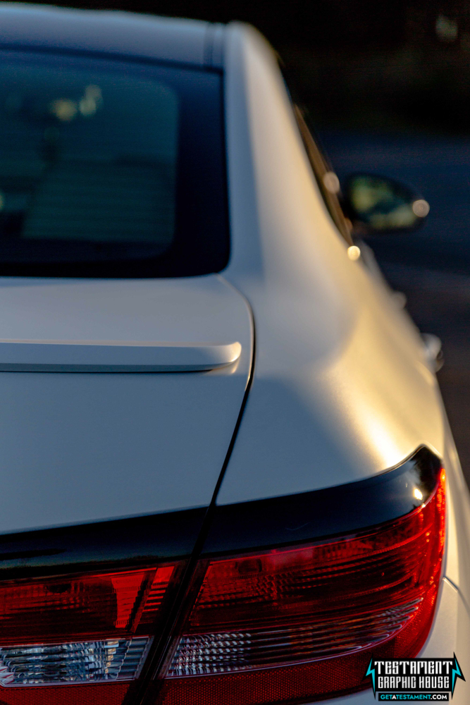 2014 Buick Verano Wrapped in 3M Satin White with a full Chrome Delete Testament Graphic House Denver NC