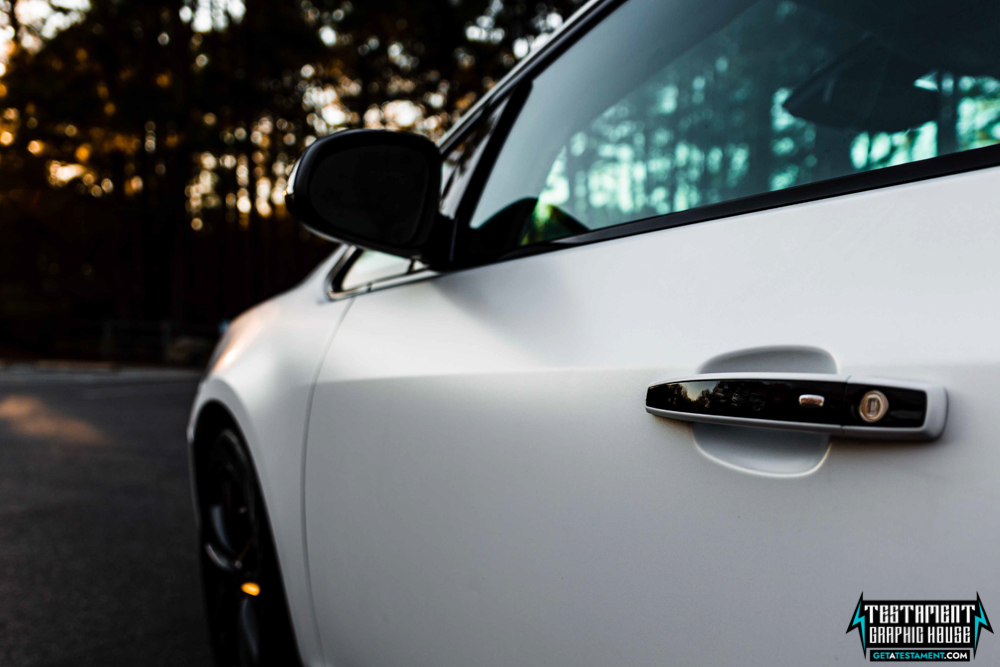 2014 Buick Verano Wrapped in 3M Satin White with a full Chrome Delete Testament Graphic House Denver NC