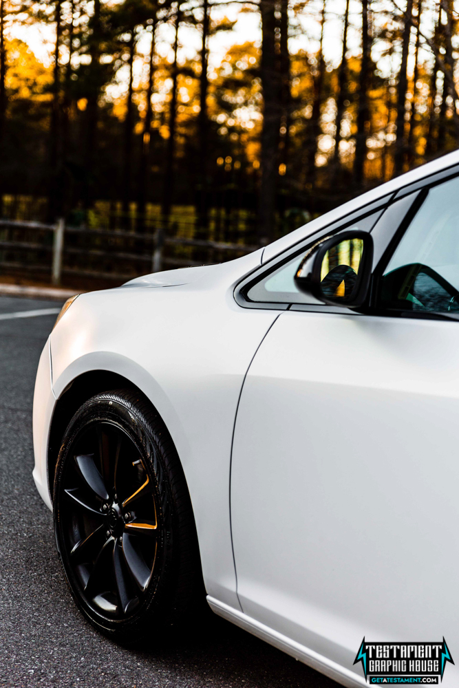 2014 Buick Verano Wrapped in 3M Satin White with a full Chrome Delete Testament Graphic House Denver NC