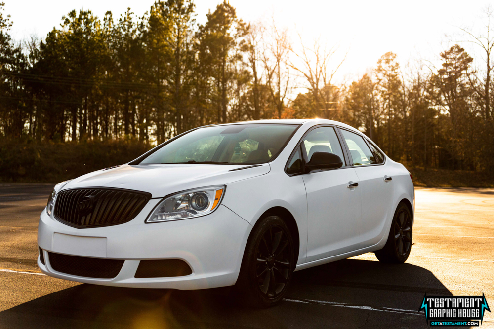 2014 Buick Verano Wrapped in 3M Satin White with a full Chrome Delete Testament Graphic House Denver NC