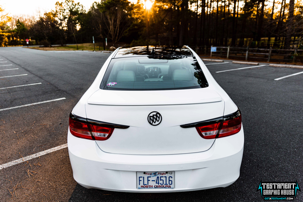 2014 Buick Verano Wrapped in 3M Satin White with a full Chrome Delete Testament Graphic House Denver NC