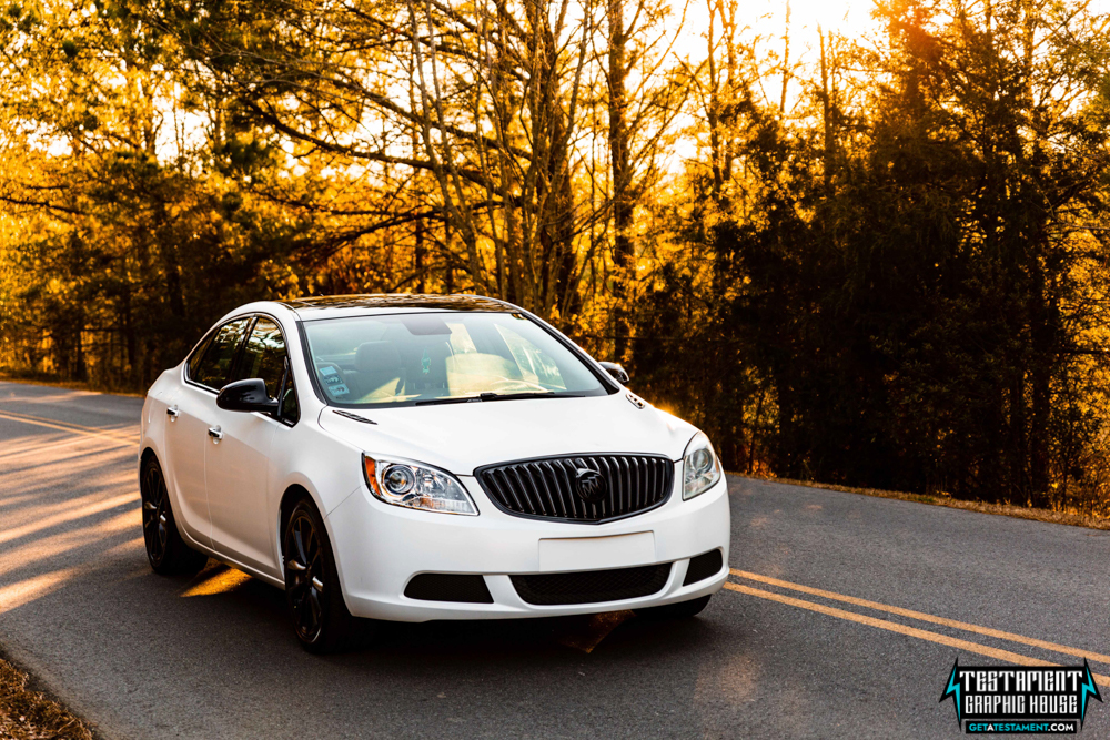 2014 Buick Verano Wrapped in 3M Satin White with a full Chrome Delete Testament Graphic House Denver NC