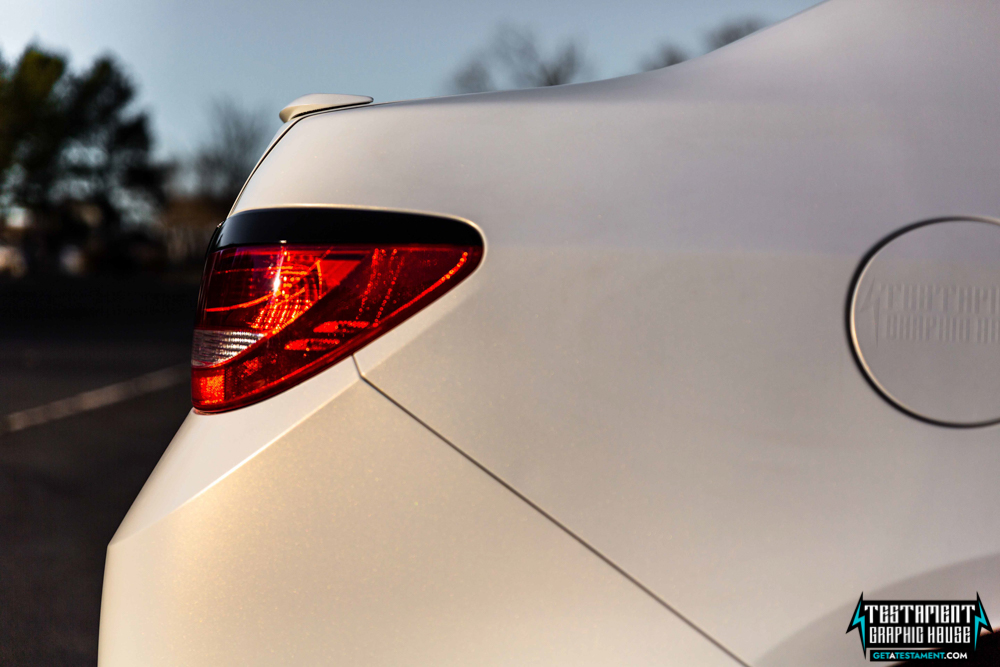 2014 Buick Verano Wrapped in 3M Satin White with a full Chrome Delete Testament Graphic House Denver NC