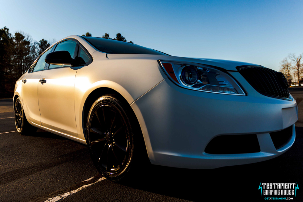 2014 Buick Verano Wrapped in 3M Satin White with a full Chrome Delete Testament Graphic House Denver NC