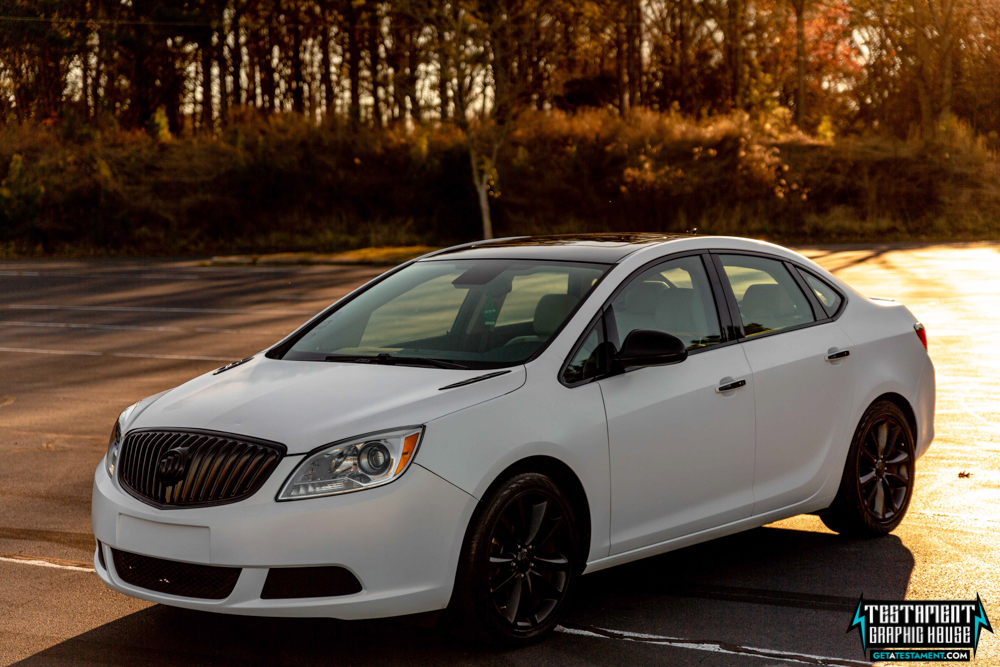 2014 Buick Verano Wrapped in 3M Satin White with a full Chrome Delete Testament Graphic House Denver NC